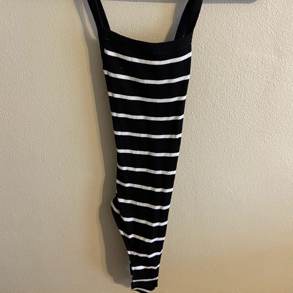 Striped black and white onesie